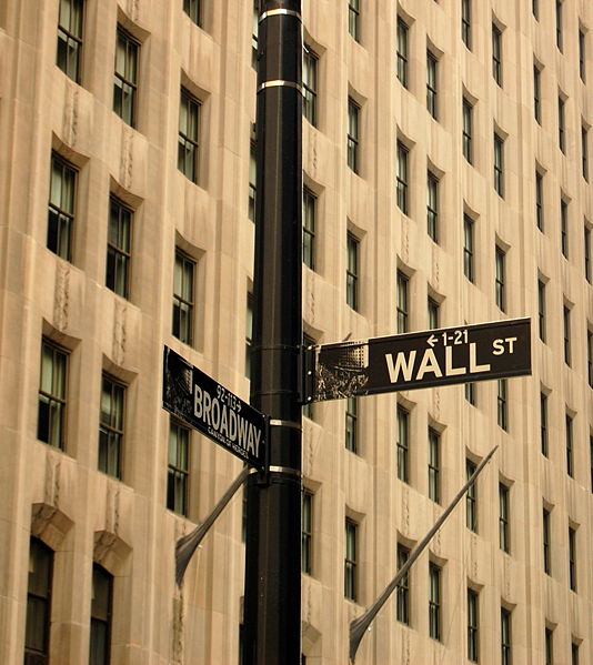 Not just a metonym, Wall Street has a sign posted.
